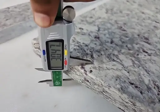 Close-up of thickness measurement