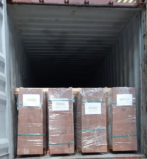 Crates loaded inside a shipping container
